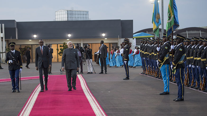 President Paul Kagame and Prime Minister Narendra Modi of India shortly after the latteru2019s arrival at Kigali International Airport yesterday. The two countries signed seven agreements in several areas last evening, with both leaders reaffirming their commitment to deeper bilateral ties. Village Urugwiro.