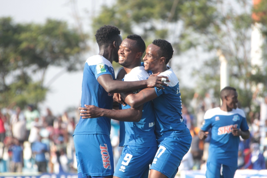 Rayon Sports forward Christ Mbondi (C) celebrates with teammates after scoring his second goal in the first-half against Marines on Tuesday at Kigali Stadium. Courtesy