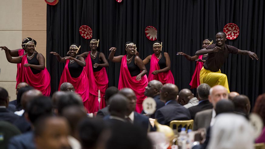 A cultural troupe entertains guests during a luncheon organised in honour of the Chinese President at Kigali Convention Centre on Monday. Village Urugwiro.