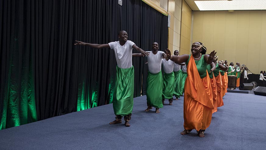 A cultural troupe performs at a state banquette hosted by President Kagame in honour of Indian Prime Minister Narendra Modi at Kigali Convention Centre on Monday. Village Urugwiro.