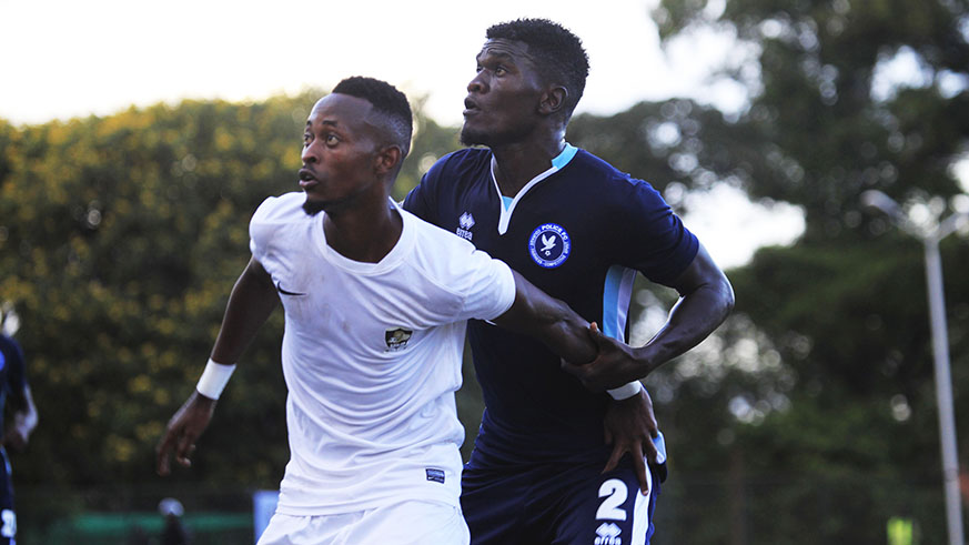 APR FC forward Issa Bigirimana battles for the ball with Police FC  defender Hussein Habimana during a past league match at Kicukiro Stadium. Sam Ngendahimana.