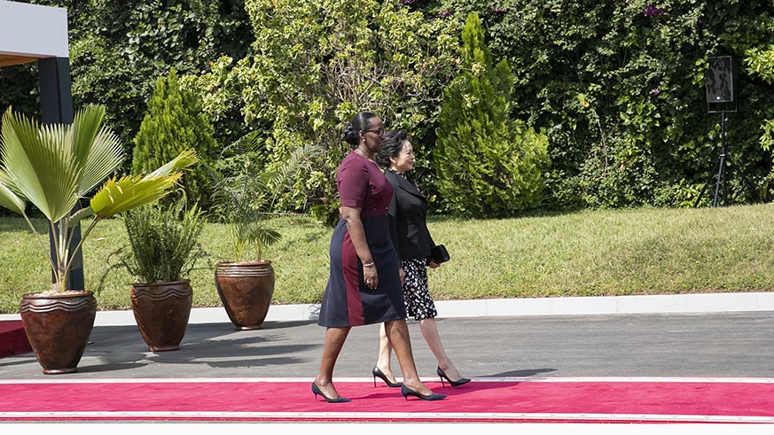First Ladies Jeannette Kagame and Peng Liyuan at Village Urugwiro in Kigali on Monday. Village Urugwiro.