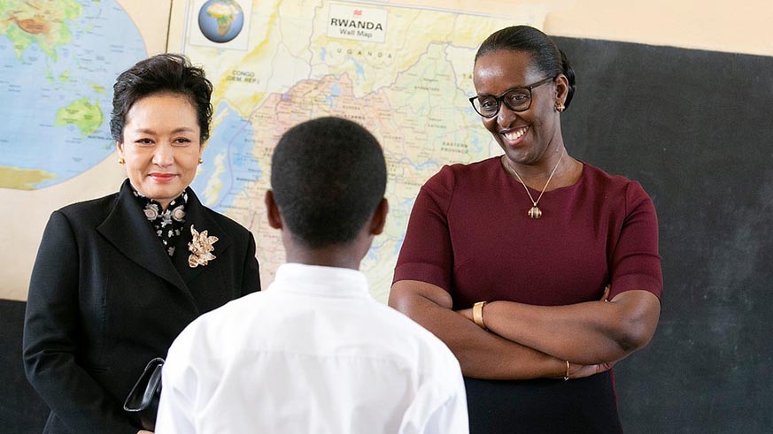 First Ladies Jeannette Kagame and Peng Liyuan during a visit to FAWE Girls School in Gisozi, Gasabo District on Monday. Courtesy.