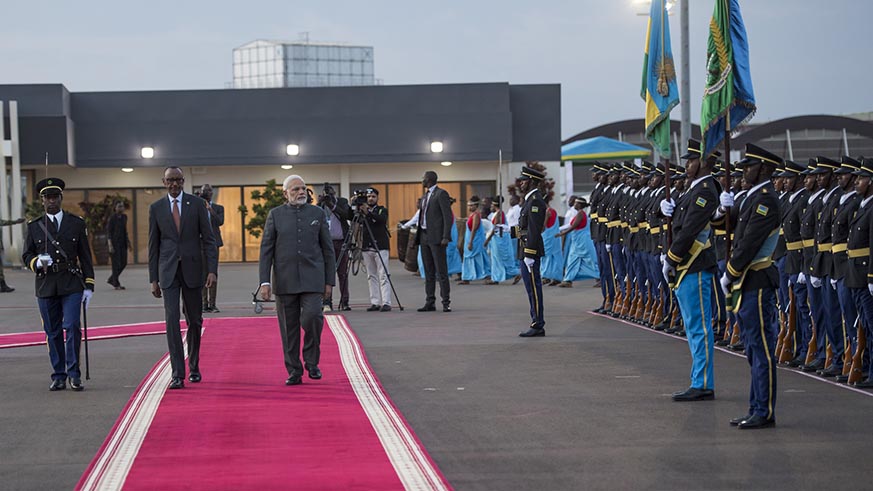 Indian Prime Minister Narendra Modi is welcomed by President Paul Kagame at a colourful ceremony at Kigali International Airport on Monday. Village Urugwiro.
