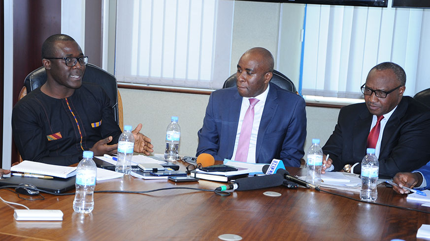 Peter Kwasi Kodjie, Secretary-General, All African Students Union (left), said they chose to have the summit in Rwanda because the country has showed great commitment to empowering the youth. Looking on are the Permanent Secretary in the Ministry of Education Samuel Mulindwa (centre) and Chairman of Pan-Africa Movement Rwanda Chapter, Protais Musoni. Kelly Rwamapera.