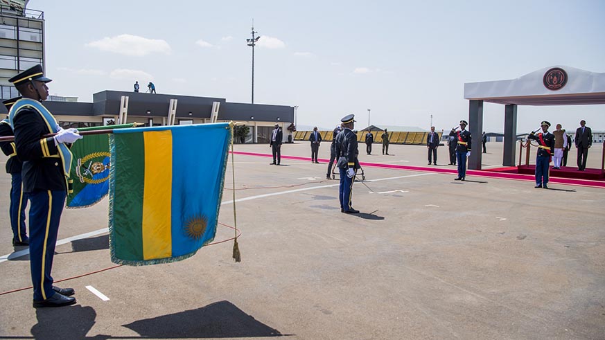 President Kagame and Prime Minster Narendra Modi (right, in the background) stand on the dais during the official ceremony to see off the Indian leader at Kigali International Airport on Tuesday. Village Urugwiro.