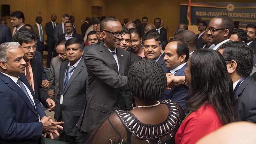 President Kagame greets some of the participants at the business forum in Kigali on Tuesday. Village Urugwiro.