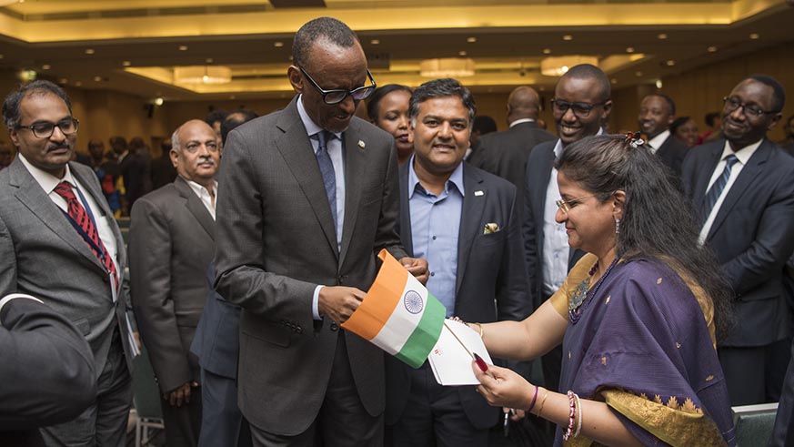 President Kagame interacts with one of the Indian participants at the business forum in Kigali on Tuesday. Village Urugwiro.