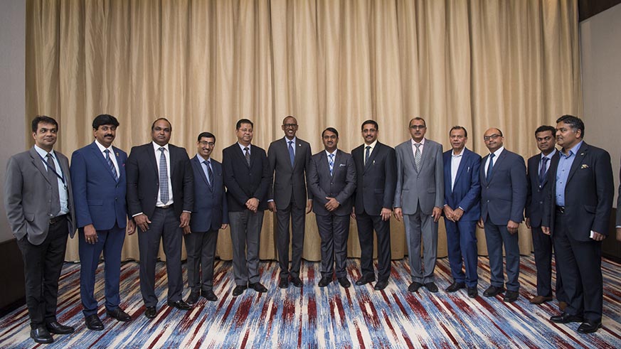 President Kagame poses with Indian business leaders in Kigali on Tuesday. Village Urugwiro.