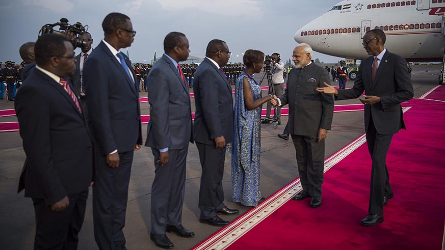 President Paul Kagame introduces some of his cabinet members to Indian Prime Minister Narendra Modi on the latterâ€™s arrival at Kigali International Airport on Monday evening. Village Urugwiro.