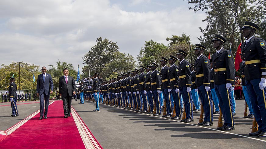 President Xi Jinping, and his host President Paul Kagame, inspect a guard of honour mounted by the Rwanda Defence Forces at Village Urugwiro on Monday. Village Urugwiro.
