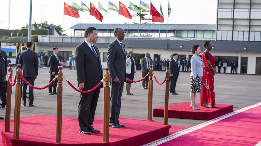 Presidents Paul Kagame and Xi Jinping and First Ladies Jeannette Kagame and Peng Liyuan observe the national anthems of the two countries at Kigali International Airport before the Chinaâ€™s First Coupleâ€™s departure on Monday. Village Urugwiro.