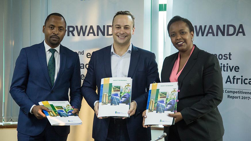 L-R: Minister for ITC Jean de Dieu Rurangirwa, Andela CEO Jeremy Johnson and RDB chief executive Clare Akamanzi pose for a photo after the MoU signing ceremony. Nadege Imbabazi.