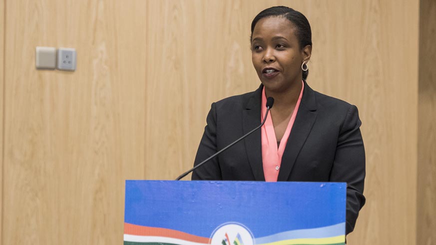 wanda Development Board chief executive Clare Akamanzi, whose institution is in charge of investment promotion, addresses business leaders and other participants at the India-Rwanda Business Forum in Kigali on Tuesday. Village Urugwiro.