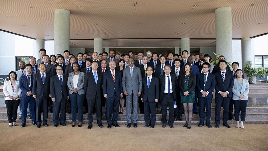 President Kagame poses with the Japanese delegates, mostly business leaders, led by the Parliamentary Vice-Minister of Foreign Affairs Manabu Horii, in Kigali yesterday. Village Urugwiro.