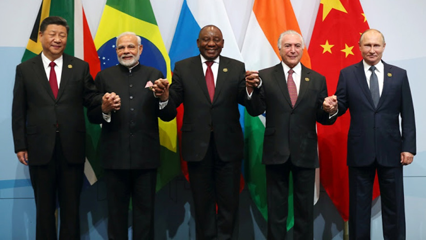Chinau2019s President Xi Jinping, Indian Prime Minister Narendra Modi, President Cyril Ramaphosa of South Africa, Brazilu2019s President Michel Temer and Russiau2019s President Vladimir Putin pose for a group picture at the BRICS summit meeting in Sandton on July 26, 2018. Net photo. 