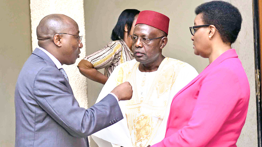 L-R: Prime Minister u00c9douard Ngirente chats with Vice Speaker Abbas Mukama and Speaker Donatille Mukantabana yesterday after presenting to the bi-cameral parliament, the Governmentu2019s actions, achievements and measures to fight malnutrition through the Early Childhood Development Programme. Sam Ngendahimana. 