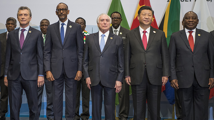 President Kagame in a group photo with other leaders at the BRICS Africa Outreach Summit at Sandton International Convention Centre in Johannesburg, South Africa on Friday. Addressing the summit, Kagame said that Africau2019s improved cooperation with BRICS member countries will have long-term benefits for all partners involved. Village Urugwiro.