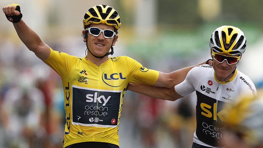 Geraint Thomas (left) crosses the line alongside his teammate Chris Froome to win Tour de France in Paris yesterday. Net photo.