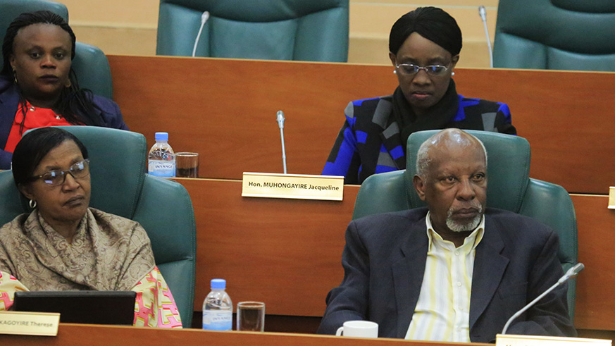 Senators follow the presentation of the report at Parliament yesterday. S. Ngendahimana.
