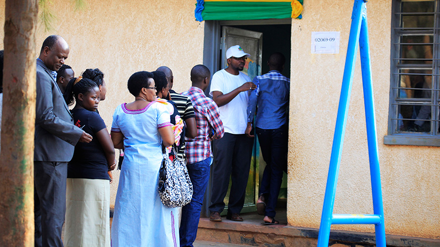 Voters queue to cast their votes during last yearu2019s presidential elections at GS Kimironko II in Kigali. Sam Ngendahimana.