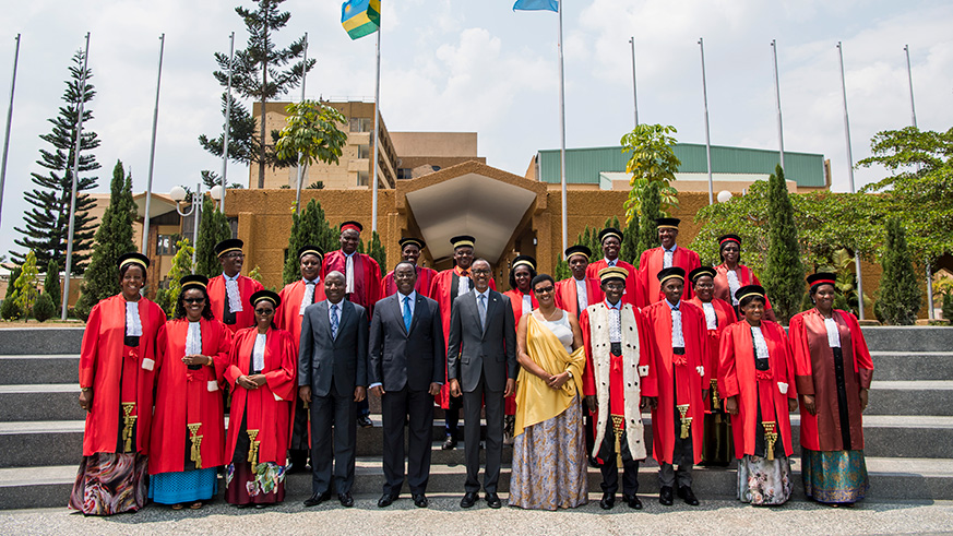 President Kagame poses for a group photo with the recently appointed judges shortly after they were sworn-in at the Parliamentary Buildings, Kimihurura yesterday. Also in the photo are Senate President Bernard Makuza (5th left), Speaker of the Lower House Donatille Mukabalisa (5th right), Chief Justice Sam Rugege (4th right) and Prime Minister u00c9douard Ngirente (4th left). Village Urugwiro.