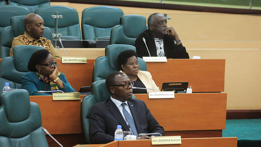 Senators follow the presentation of the report on Monday (Sam Ngendahimana)