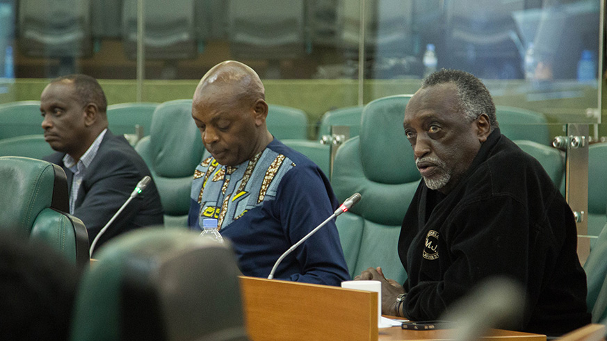 Senator Tito Rutaremara (right) speaks during a session of the Upper House recently. Nadege Imbabazi.