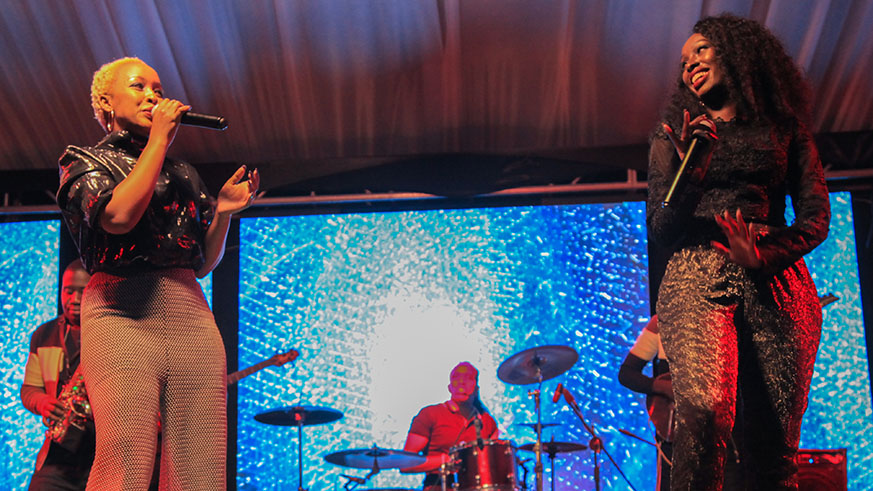 Charly and Nina singing during the concert. (Faustin Niyigena)