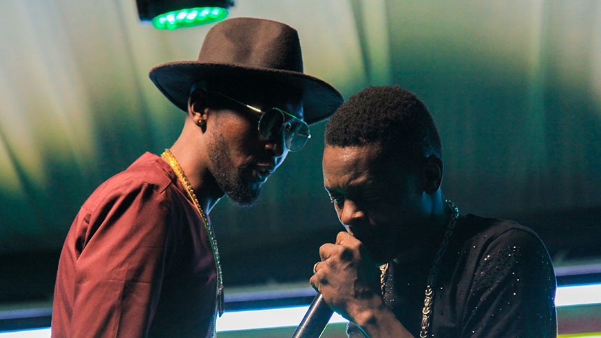 DJ Pius and Chameleone on the stage last Friday. (Faustin Niyigena)