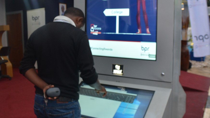 A client uses the BPR online banking service. / ElisÃ©e Mpirwa