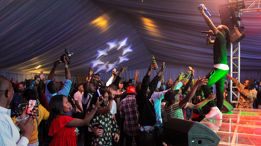 Music fans in Kigali showed love to Weasel last Friday. (Faustin Niyigena)