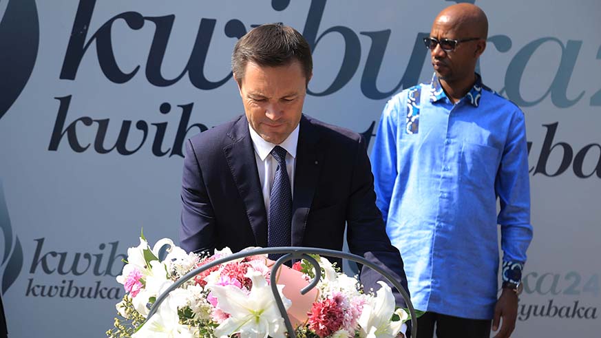 The president of the International Cycling Union (UCI) David Lappartient lays wreath at Kigali Genocide Memorial yesterday (Sam Ngendahimana)