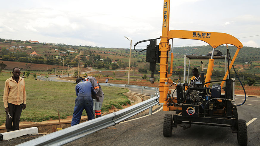 Workers doing final touches on a road in Nyagatare.  Sam Ngendahimana.