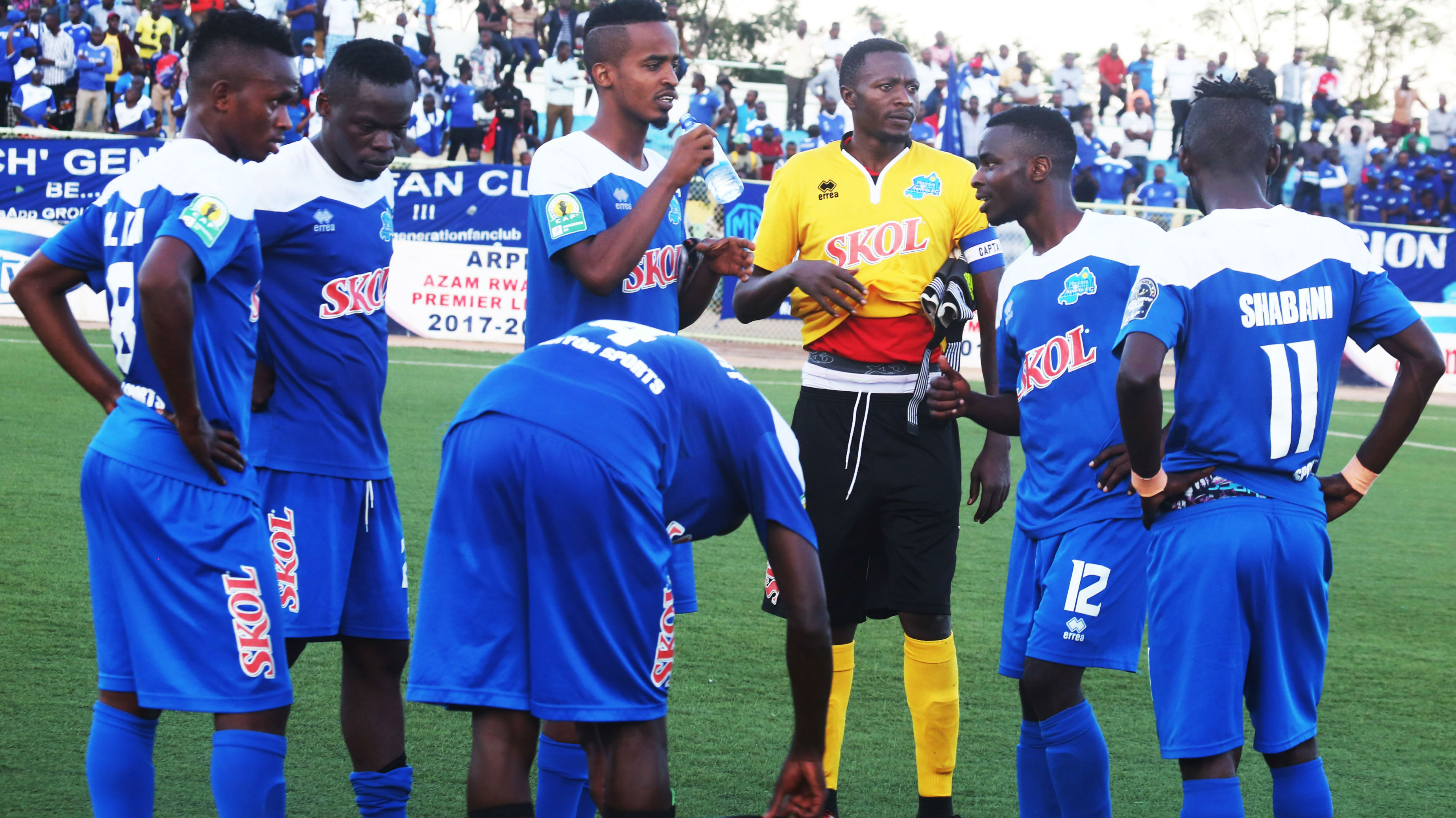 Rayon Sports players have a chat during half-time break in a past league match at Kigali Stadium. Sam Ngendahimana