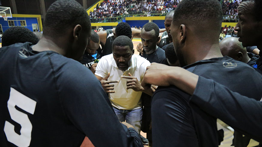 Patriots head coach Henry Mwinuke gives instructions to his players during the playoff game against REG last week. Sam Ngendahimana.