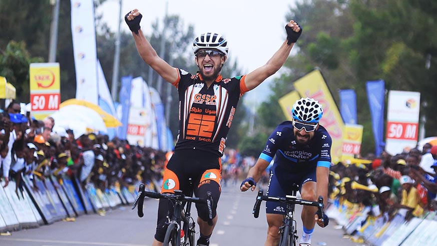 Tour du Rwanda 2018 stage 1 winner Ladag Azzedine of Algeria celebrates his victory as Lozano Riba of USA Team Novo Nordisk becomes the second in Rwamagana yesterday. Sam Ngendahimana.
