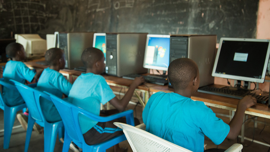 Students during computer science class. Government is revising the academic calendar. Nadege Imbabazi