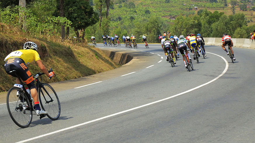 Yellow jersey holder Azzadine crosses the challenging corner of Kamonyi