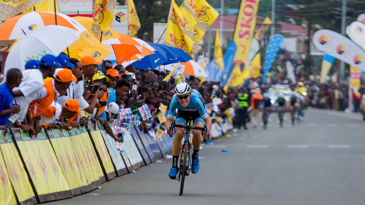 Julian Hellmann sprints to the finish-line in Musanze yesterday as thousands of spectators on the roadside cheer on. Sam Ngendahimana