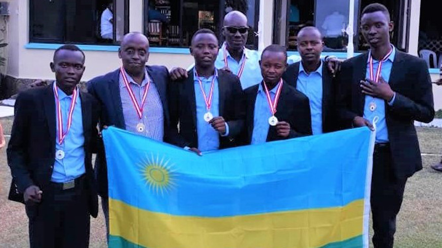 Rwandau2019s national golf team show off their medals and Rwandan flag after finishing second, at the 2018 Africa Region IV golf challenge at Nyali Golf and Country Club in Mombasa, Kenya on Sunday. Courtesy.