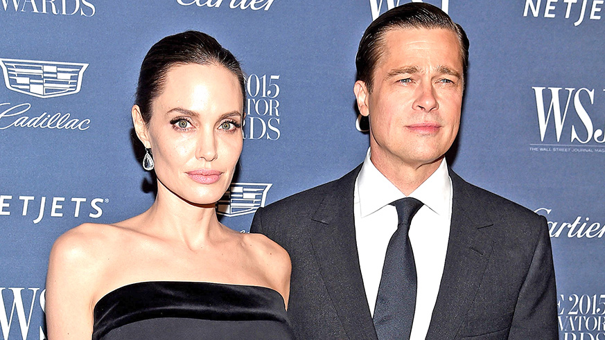 Angelina Jolie and Brad Pitt  during happier times. Net photo