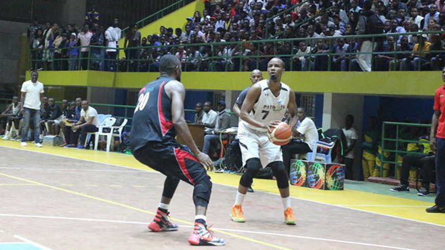 Patriots shooting guard Lionnel Hakizimana attempts a three-pointer during Game 1 of their playoffs finals against REG at Petit - Stade Remera last month. File photo.