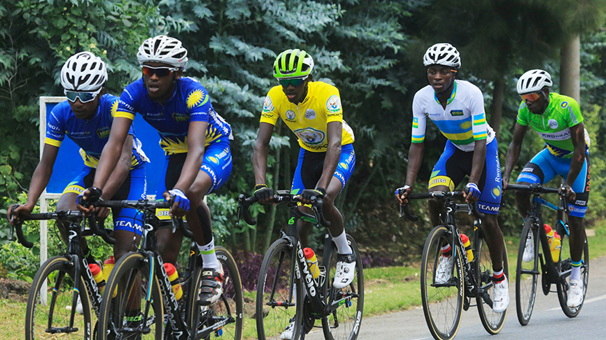 Team Rwanda captain Samuel Mugisha (middle) is seen here riding in a group with his teammates during Stage 6 from Rubavu to Kinigi in Musanze district on Friday. The 20-year old has been in Yellow Jersey since Stage 2 on Monday.  Sam Ngendahimana. 