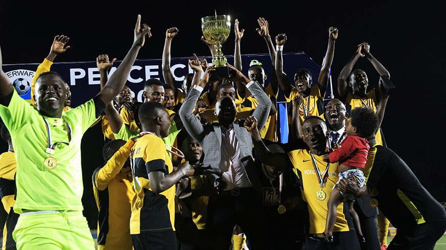 Mukura VS players and staff celebrate at Kigali Stadium yesterday. 