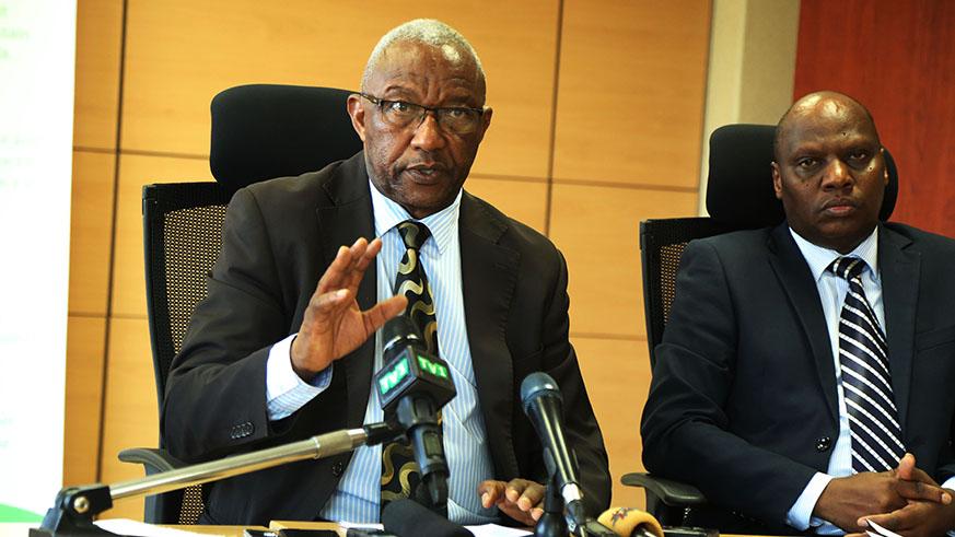 The National Electoral Commissionu2019s chairperson Prof. Kalisa Mbanda (left), and Charles Munyaneza, the Commissionu2019s Executive Secretary during a news briefing. Sam Ngendahimana.