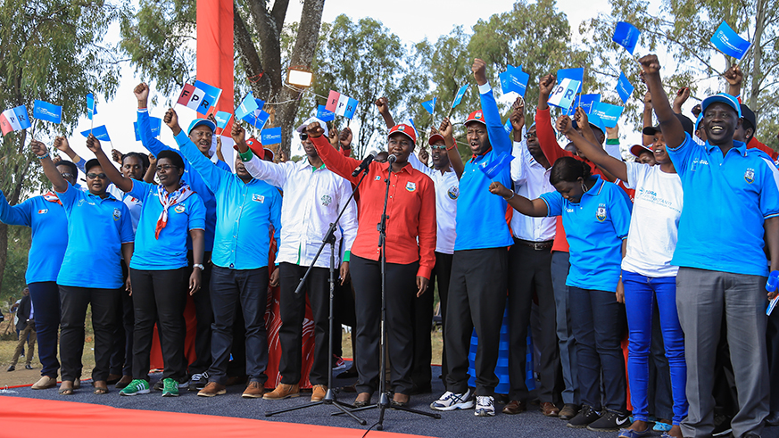The campaign manager for RPF-Inkotanyi, party commissioner Julienne Uwacu (C), introduces the 80 parliamentary candidates of RPF-Inkotanyi and its coalition partners to the residents of Rulindo District yesterday. Nadege Imbabazi.