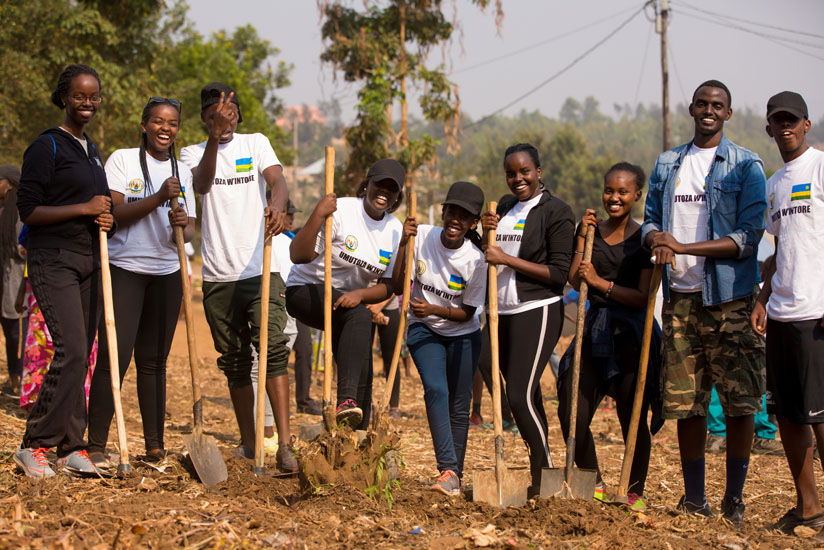 Students pose for a photo during Umuganda exercise.  File photo. 