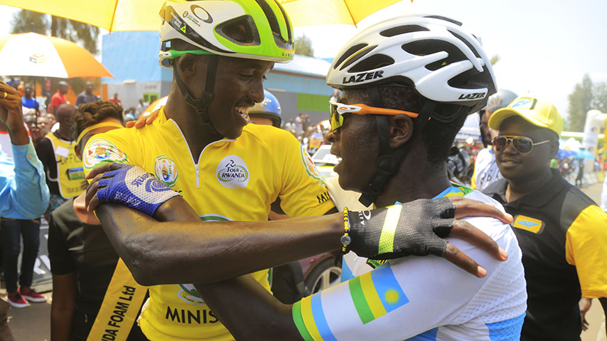 Tour du Rwanda 2018 winner Samuel Mugisha (left) thanks his compatriot Didier Munyaneza for supporting him in his quest for glory throughout the race. They will both ride in Tour du2019Espoir  in France. Sam Ngendahimana.