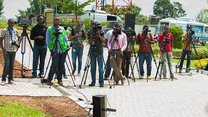 Journalists cover a past event. Nadege Imbabazi. 